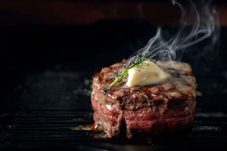 fillet steak perfectly cooked on a grill