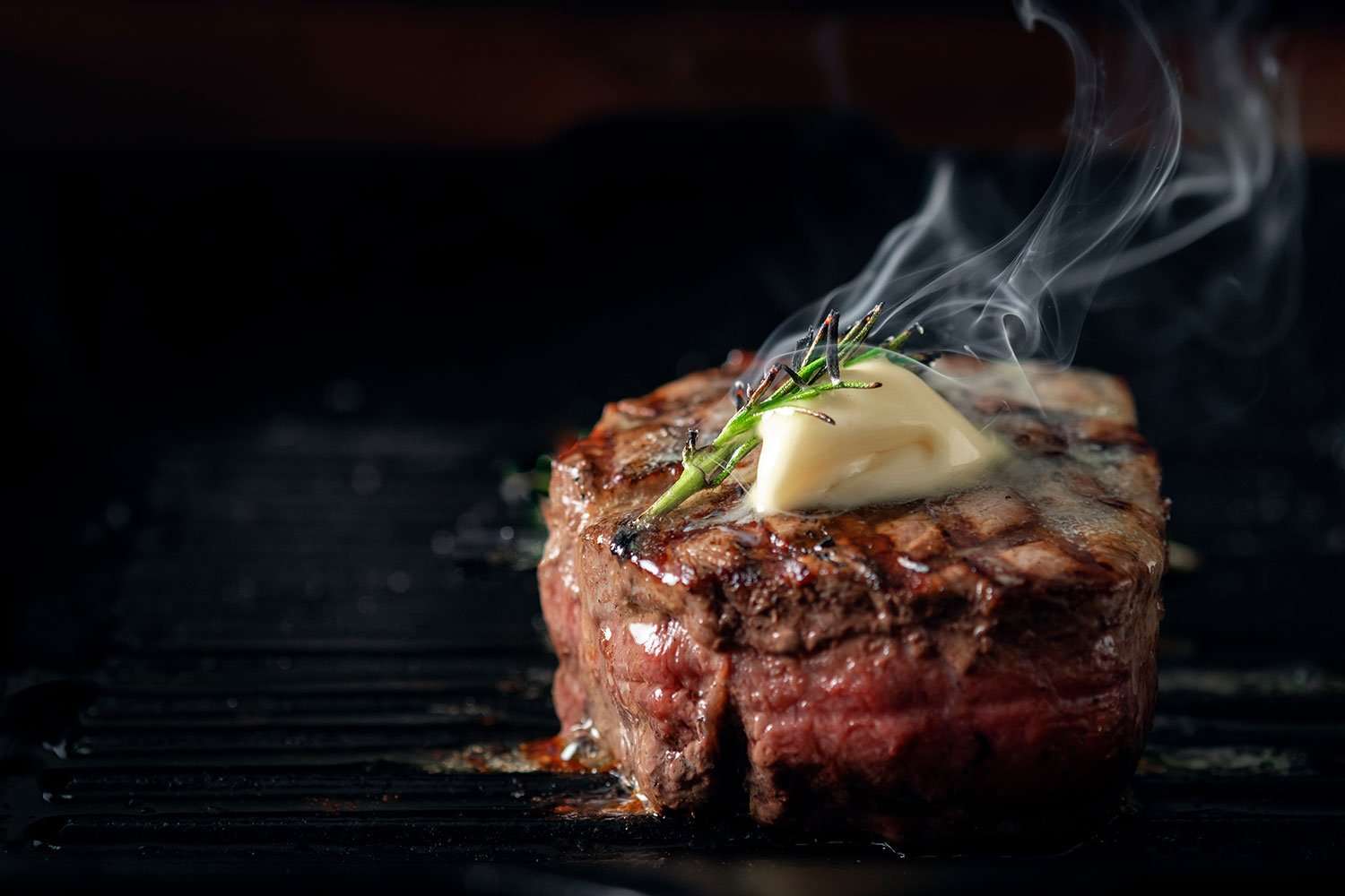 fillet steak perfectly cooked on a grill