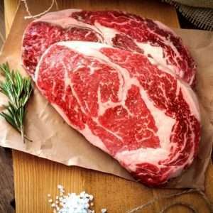 Ribeye Steak on a wooden board